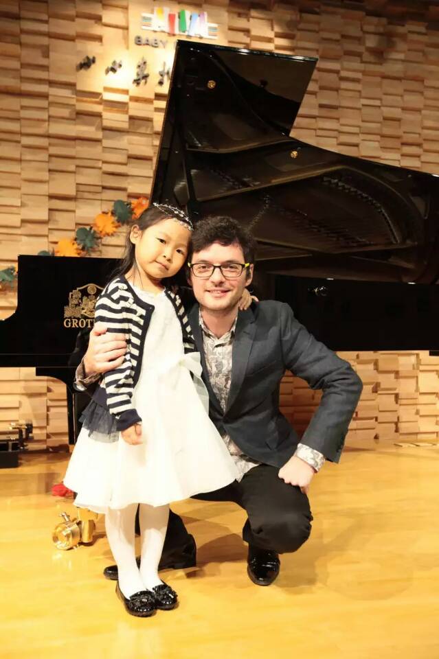 Pianist Marko Pavlović with piano student Noelle after a piano recital